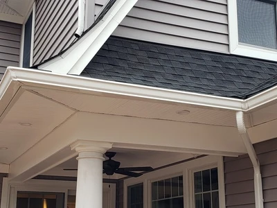 Large residential gutter installation - Need: 800x800px showcase image of completed luxury home project