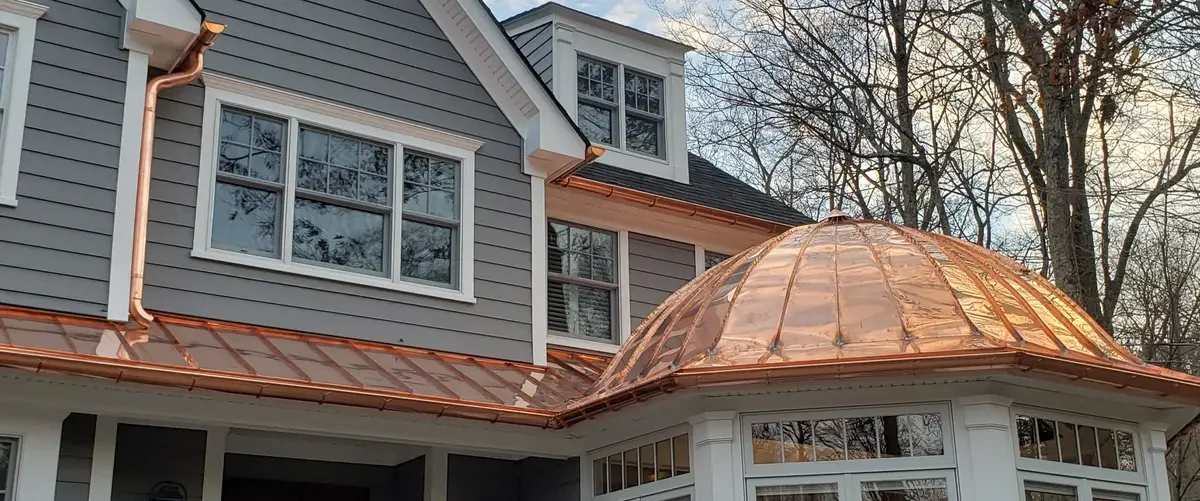 Full patina copper gutters - Need: 400x300px image of copper gutters with complete green verdigris patina