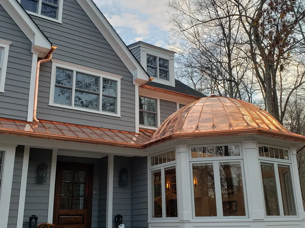 New copper K-style gutters - Need: 400x300px image of bright new copper K-style gutters