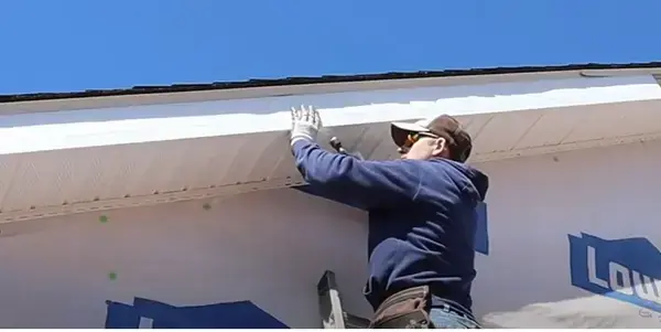 Fascia board installation - Need: 600x500px image of professional installing fascia boards